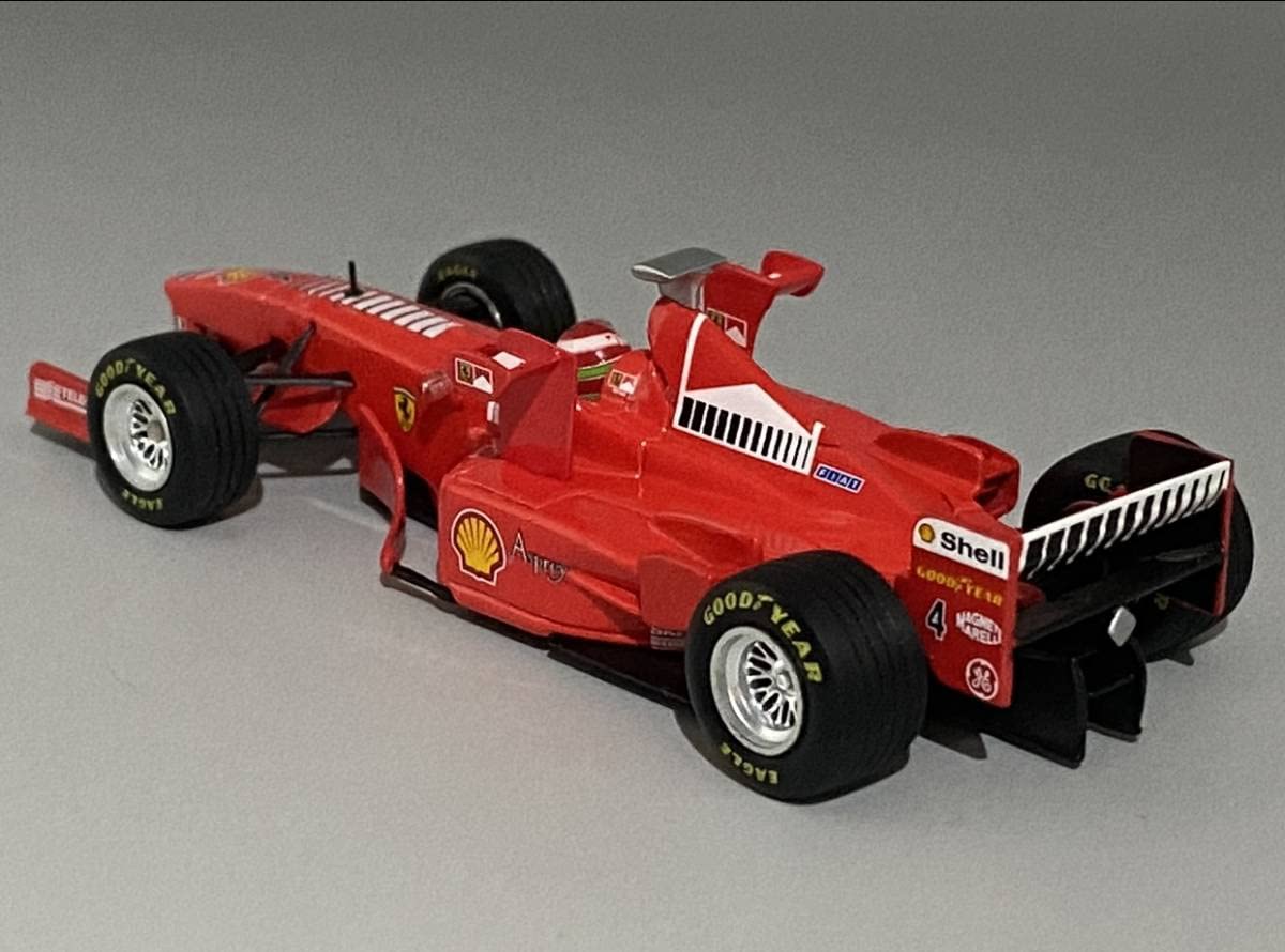フェラーリ F300V10　ミニチャンプス Amazon | Minichamps 1/43 Ferrari F300 Tower Wing 1998 Eddie Irvine