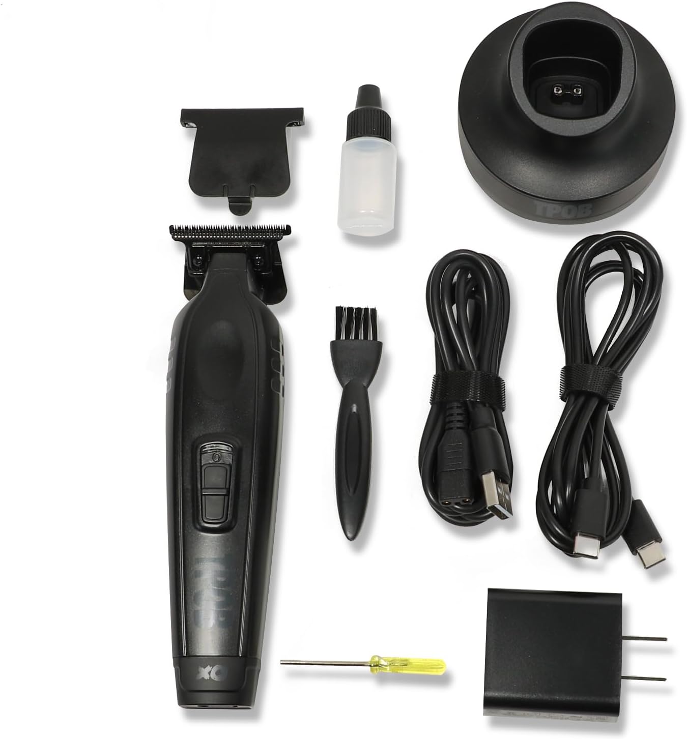 Contents of the TPOB XO Premium Brushless Trimmer kit, including the trimmer, charging base, guide combs, oil, cleaning brush, and power adapter.