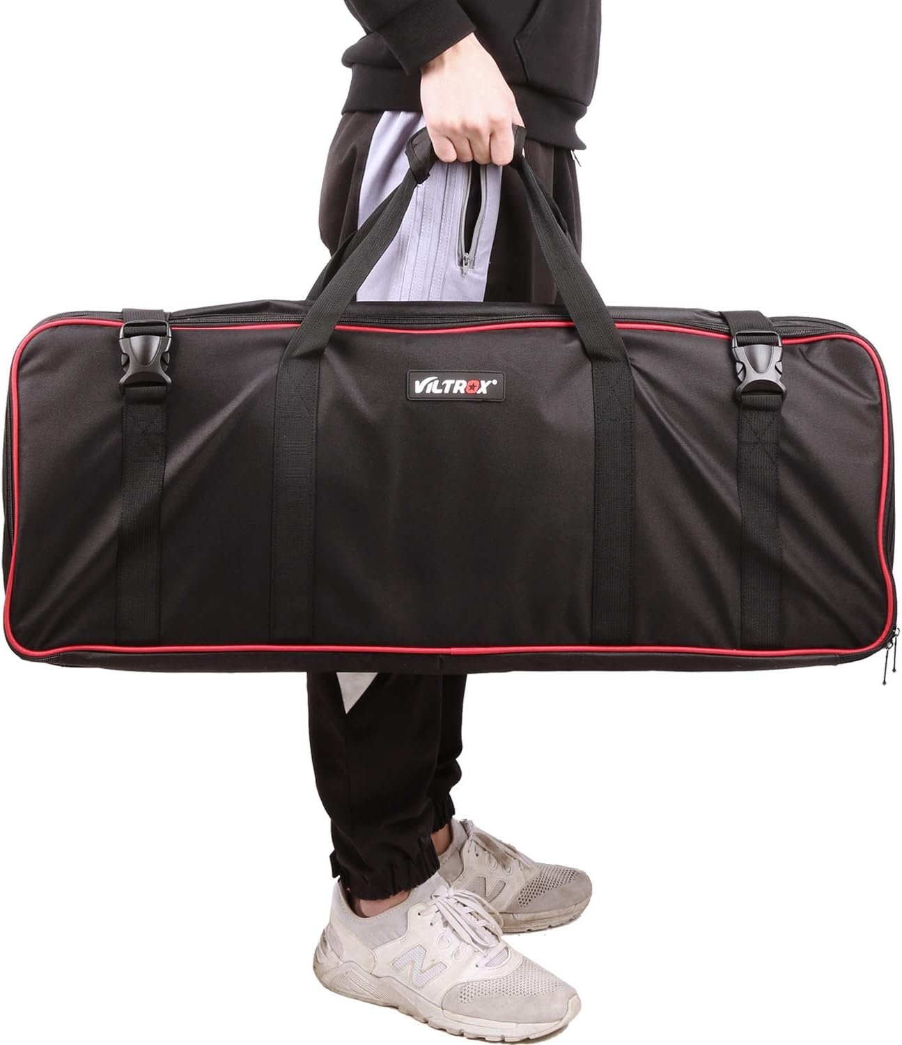 Person carrying the VILTROX light kit bag