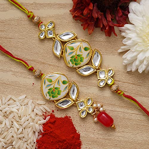 Image of eCraftIndia Set of 2 Purple Floral & Pearl Designer Rakhis with Roli Chawal Pack and Best Bro Ever Fridge Magnet