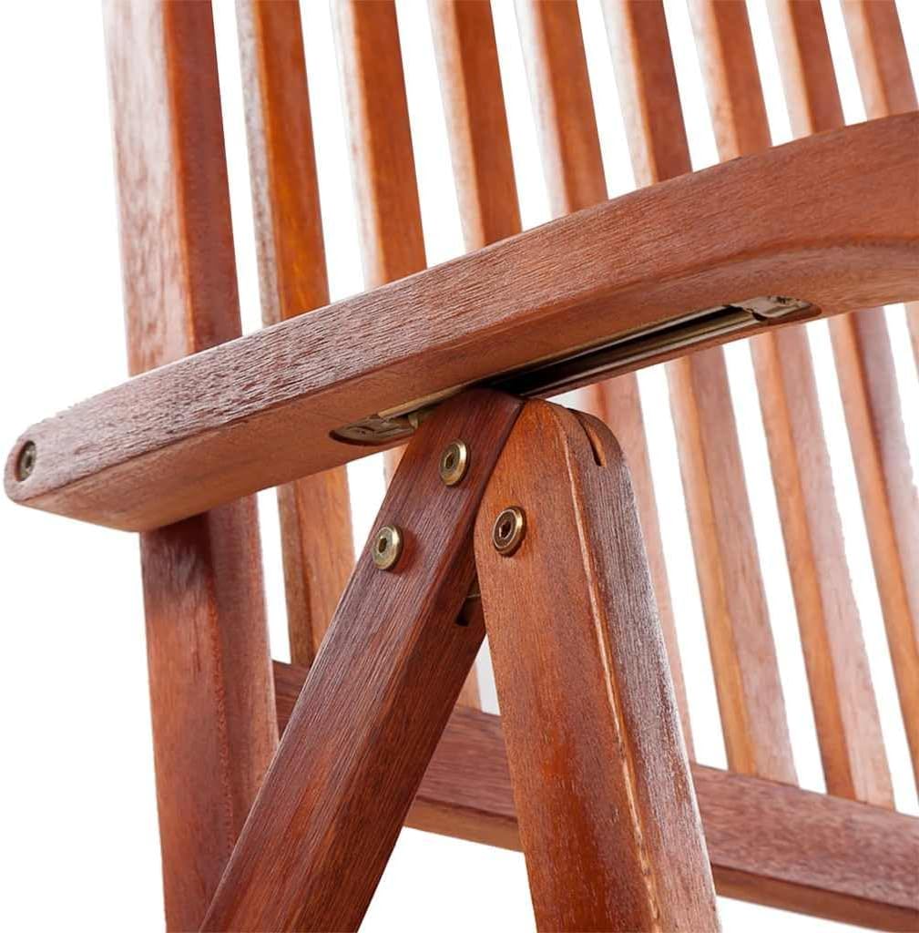 Крупним планом view of the recline adjustment mechanism on the armrest of the vidaXL chair, showing the metal pin and notches.
