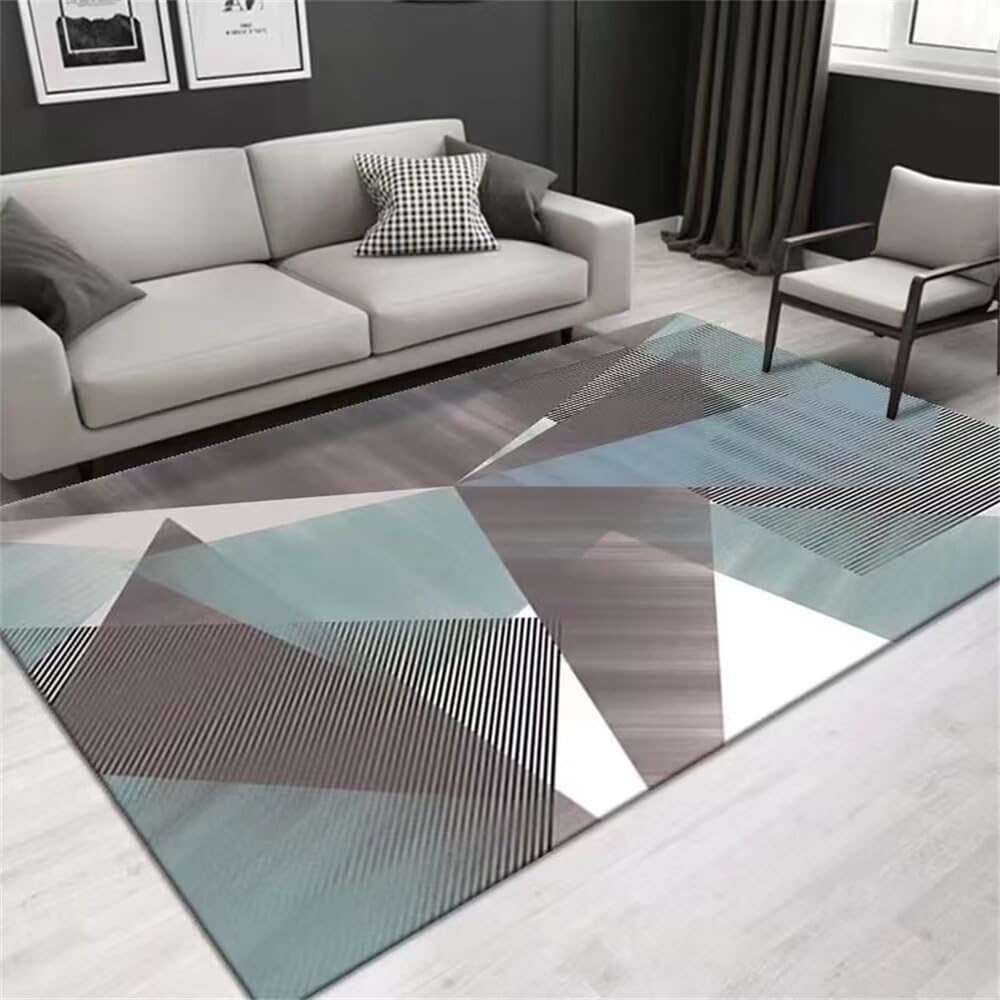 Tapis de salon design gris-bleu fini les sols froids et usés