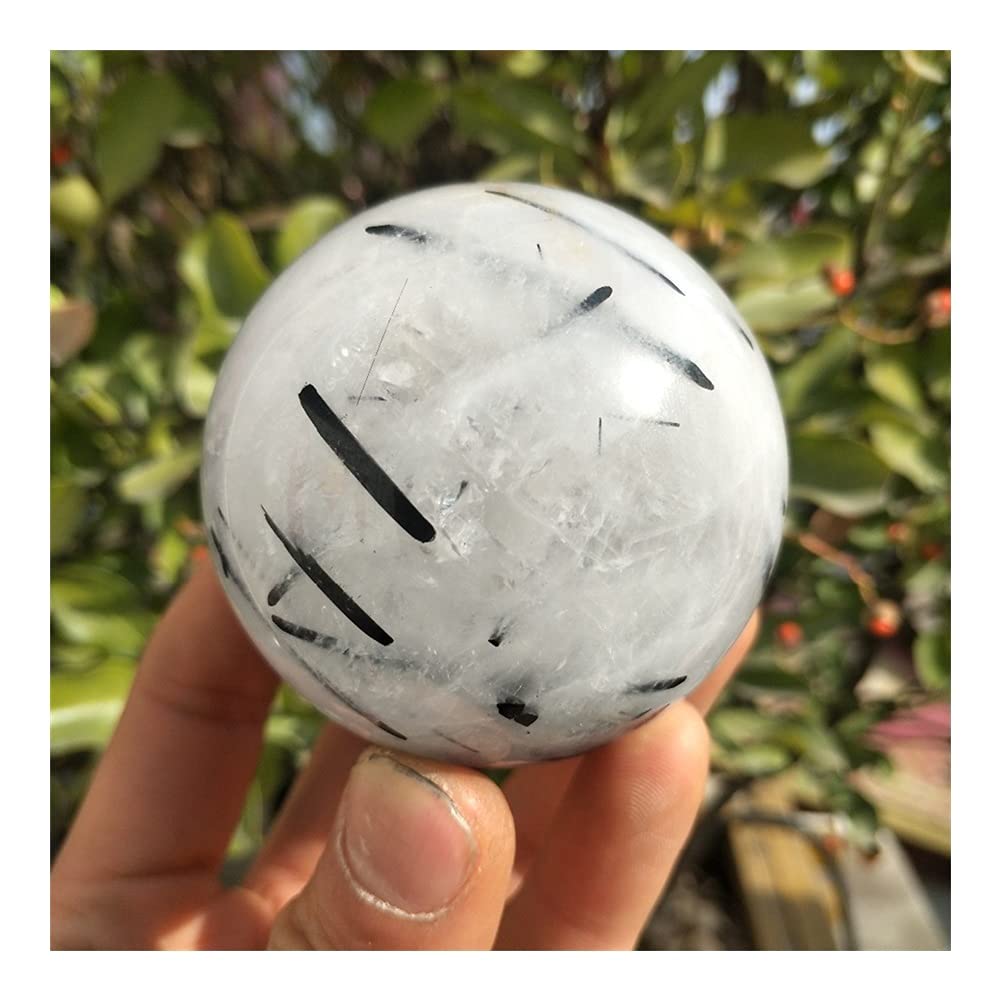 Sphère en quartz de cheveux noirs et tourmaline pour harmoniser la déco de votre chambre