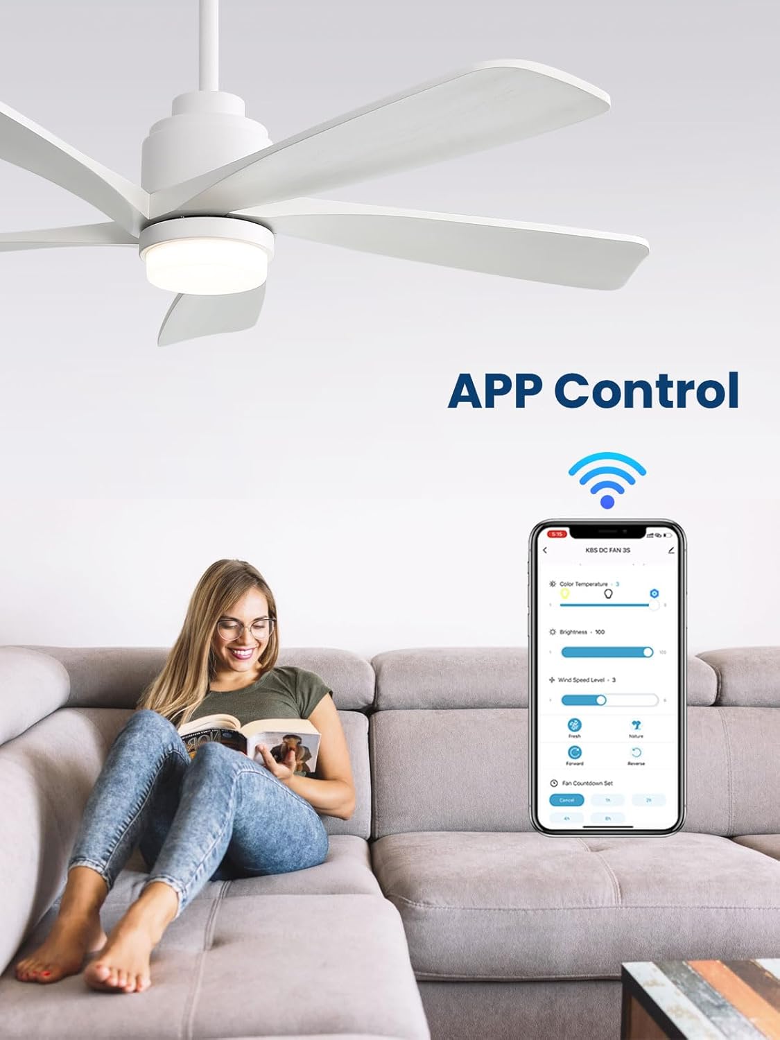 A woman relaxing on a sofa, controlling the ceiling fan's light color temperature and wind speed level via a mobile app on her smartphone.