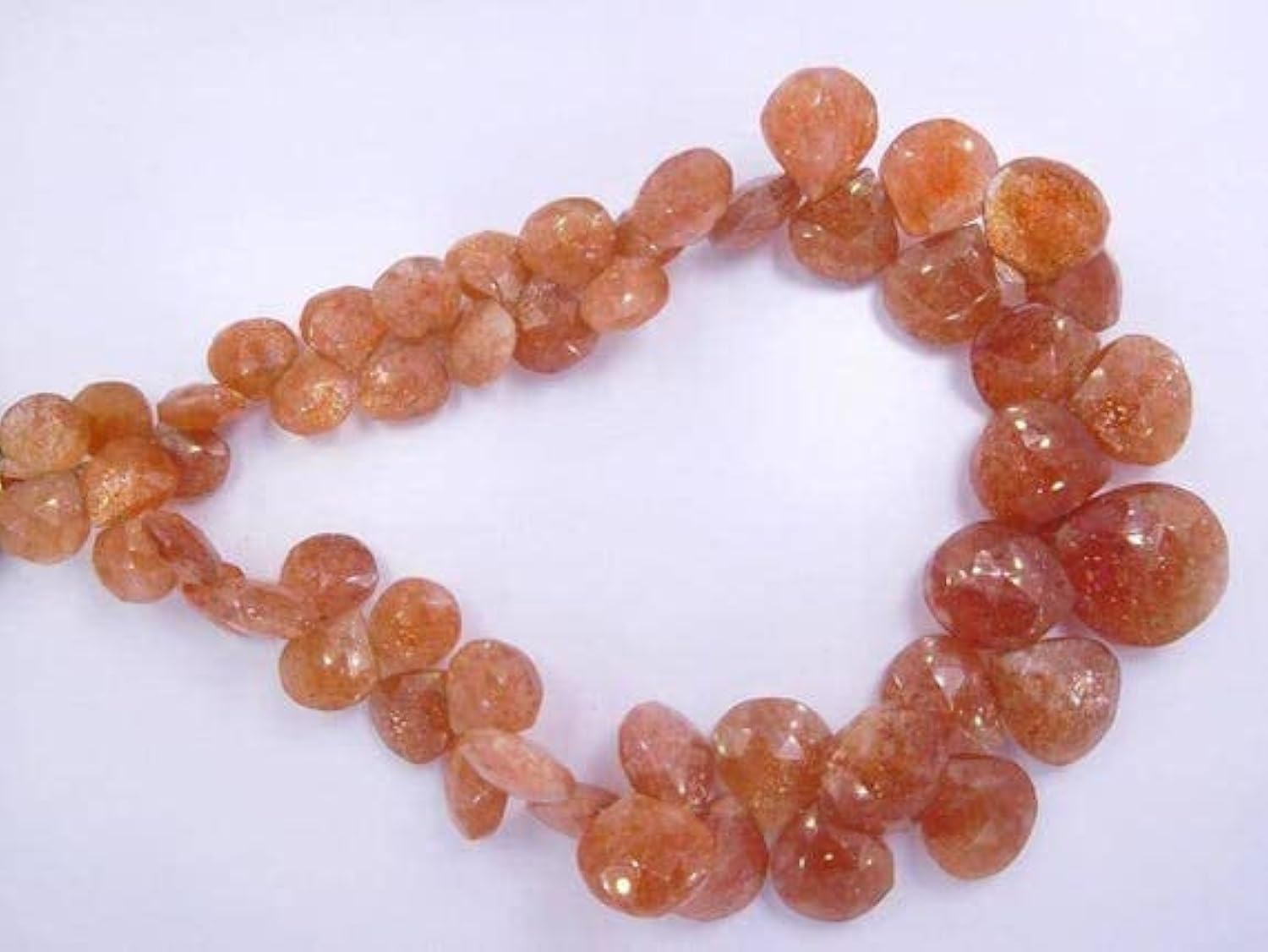 Pierre de soleil naturelle 9-18mm en cœurs facettés pour création de bijoux LKBEADS.
