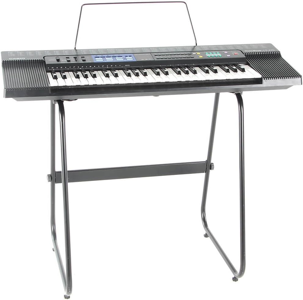 Casio CTK-2400 keyboard with music rest attached, on a stand
