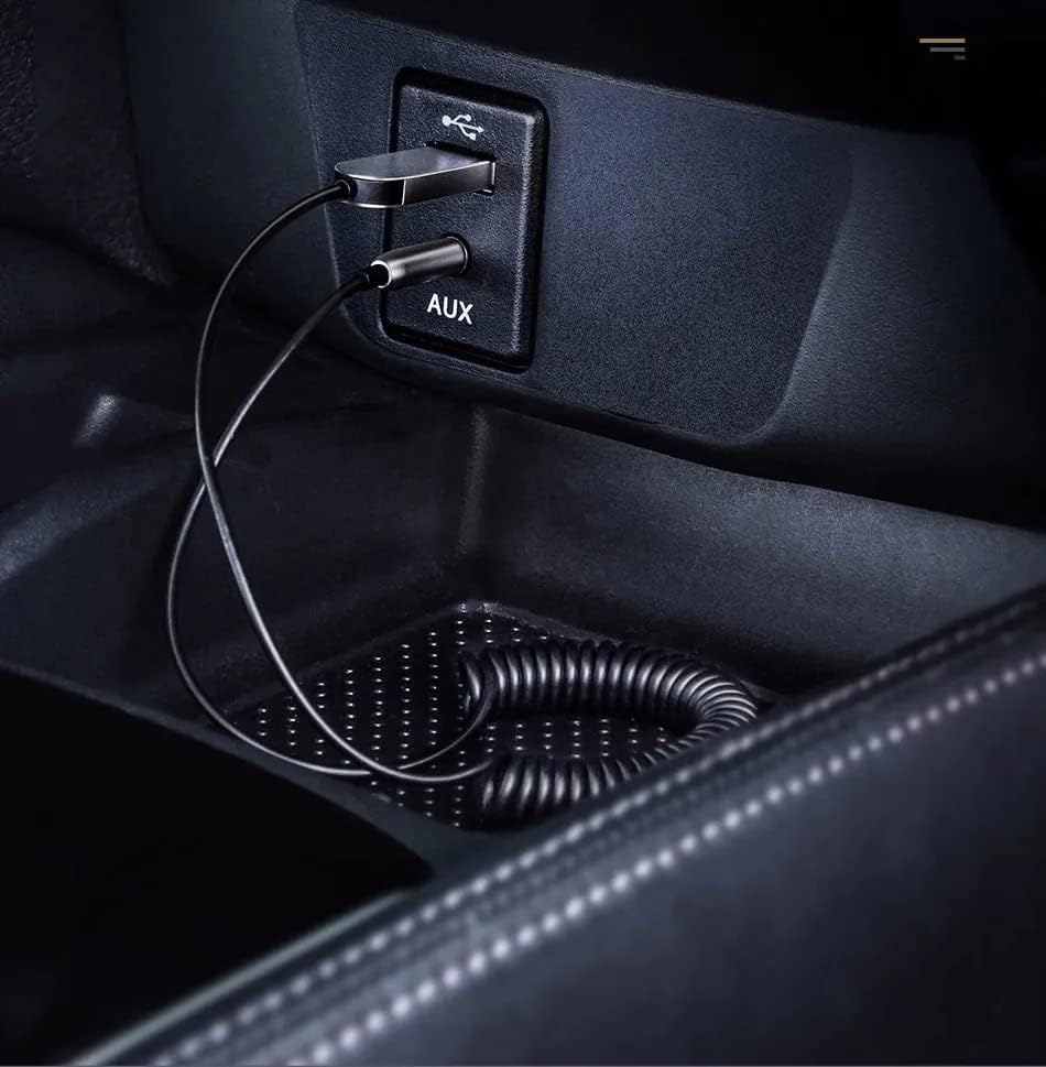 Baseus Bluetooth 5.0 Car Audio Adapter connected to car USB and AUX ports