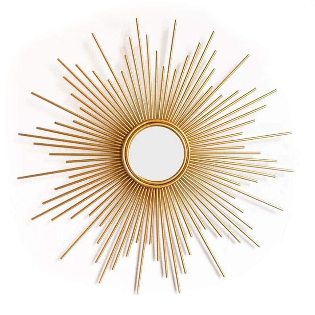Miroir mural sunburst or brossé pour agrandir et éclairer un salon sombre