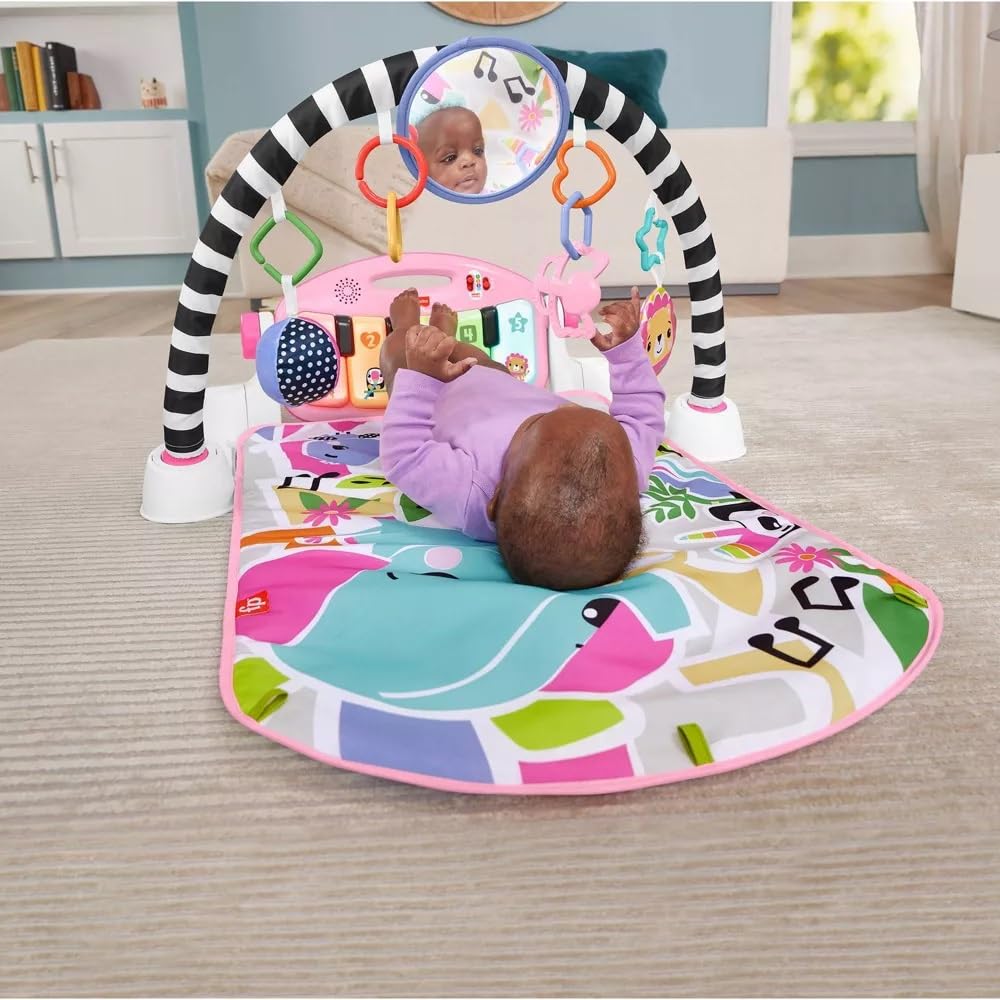 Fisher-Price Glow & Grow Kick and Play Gym – Tapis de Jeu Rose pour bébé avec 4 façons de Jouer, Apprentissage des étapes intelligentes, 10 Jouets reliables et Piano Amovible pour Nouveau-né et Plus