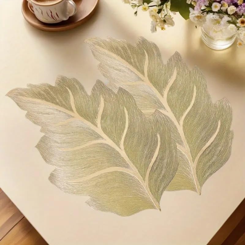 Image of Dakshya Industries Set of 2 PVC Waterproof Leaf Design Table Placemats | Premium Gold Finish Dining Table Mats | Heat Resistant, Washable & Anti-Slip | Decorative Kitchen & Dining Mats (Gold)