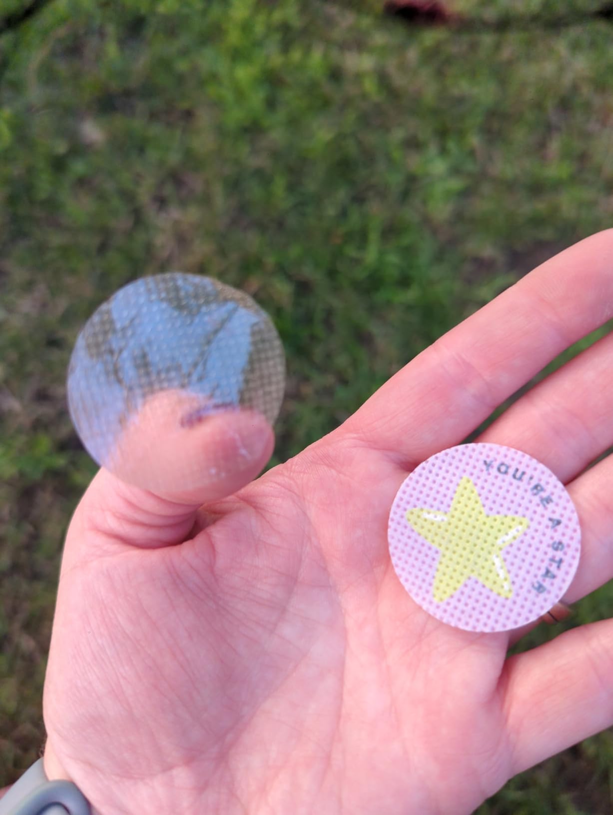 Kidoo Patch sticker on a child's clothing — verified customer photo