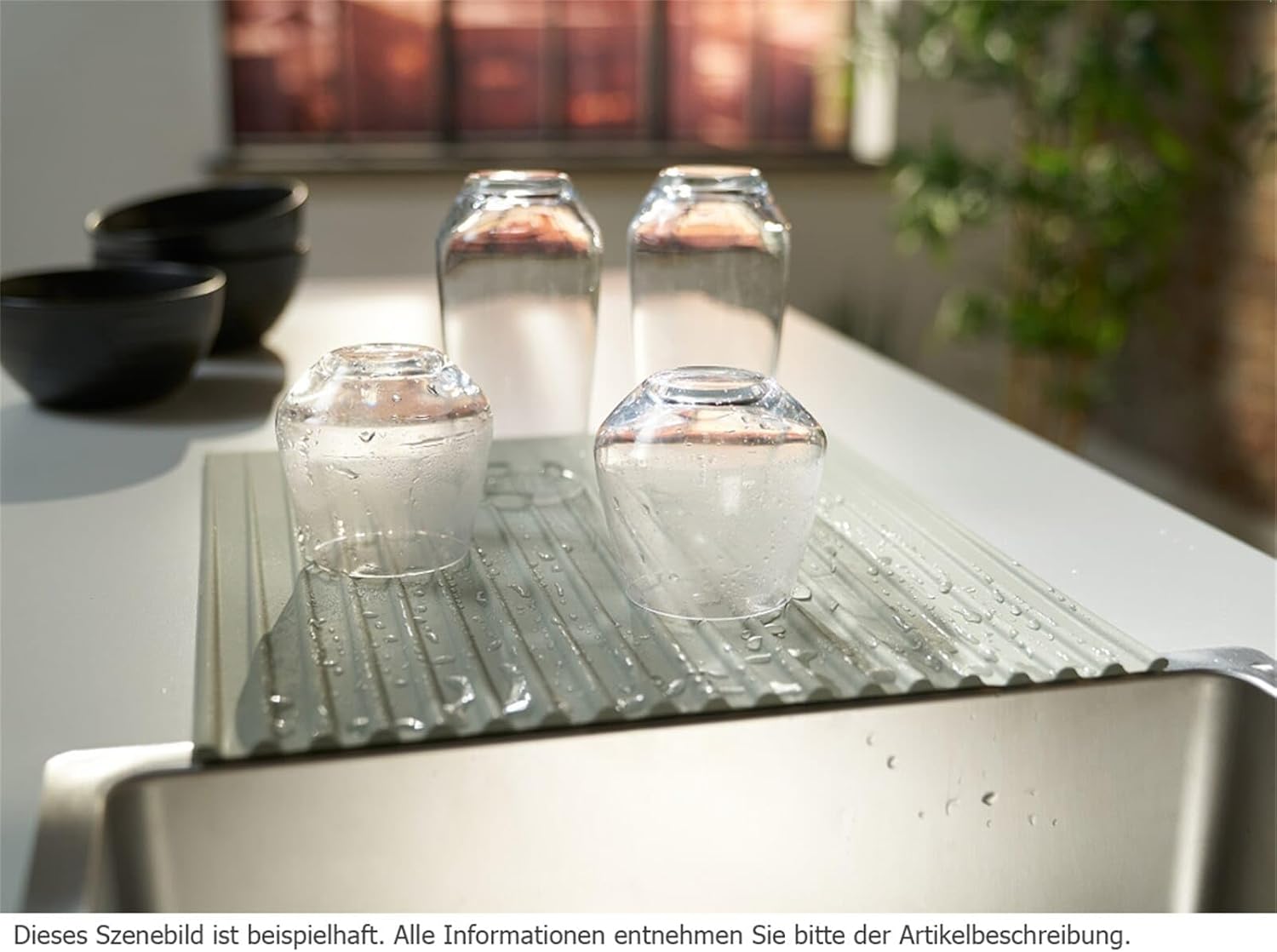 Estora plegable de silicona que s'utilitza com a escurreu-gots