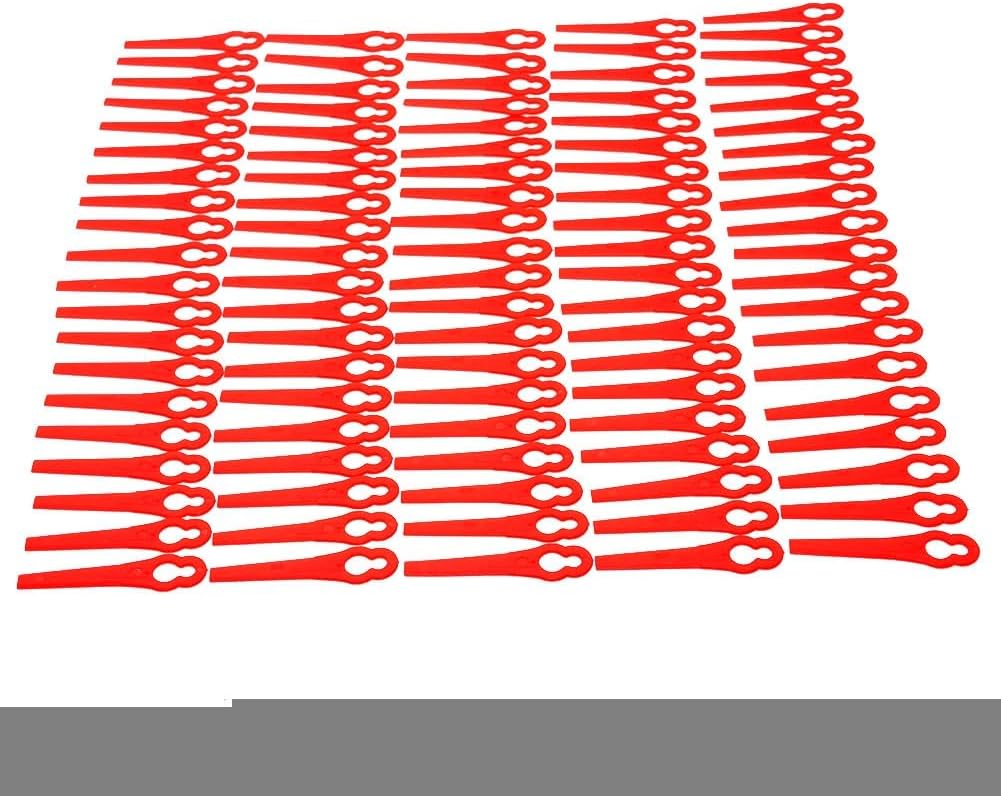 A close-up view of several red plastic grass trimmer blades, showing their attachment holes.
