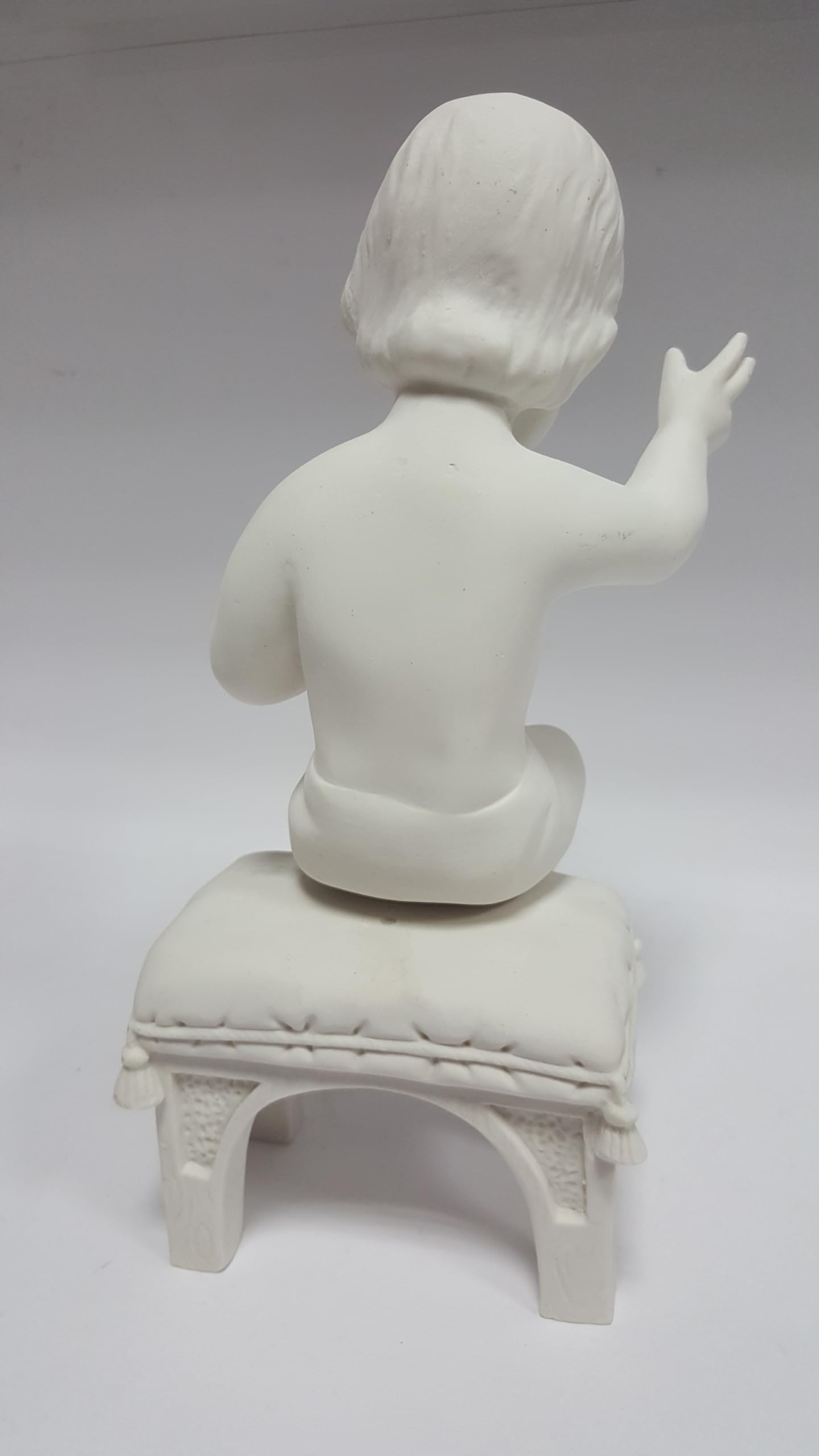 Bambino Seduto