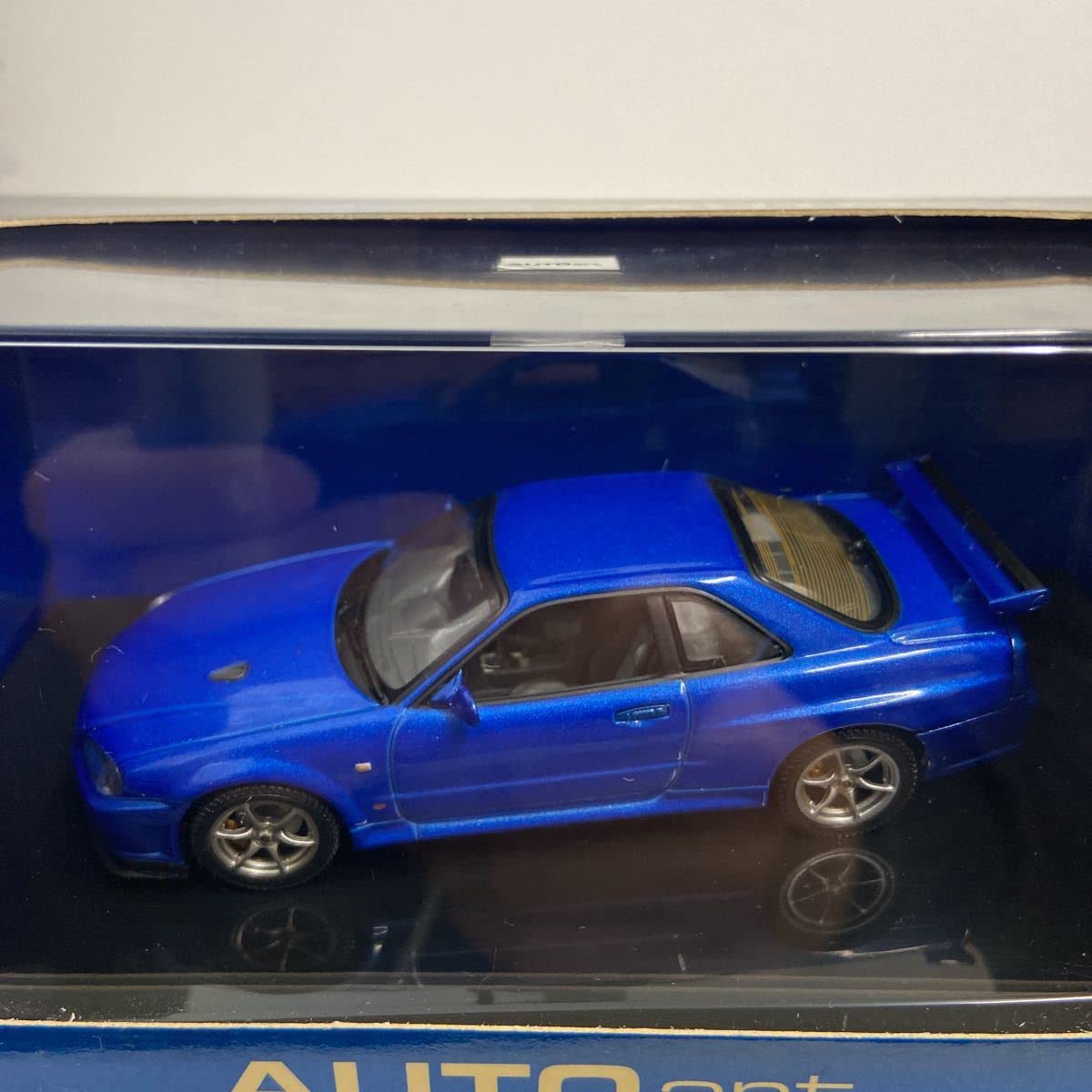 オートアート ニッサンスカイラインGT-R R34VスペックIIベイサイドブルー 楽天市場】ミニカー 1/18 日産 スカイライン GT-R R34 Vスペック