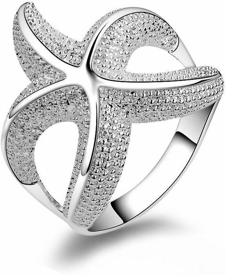 Bague mariage étoile de mer en or blanc et diamant précieux