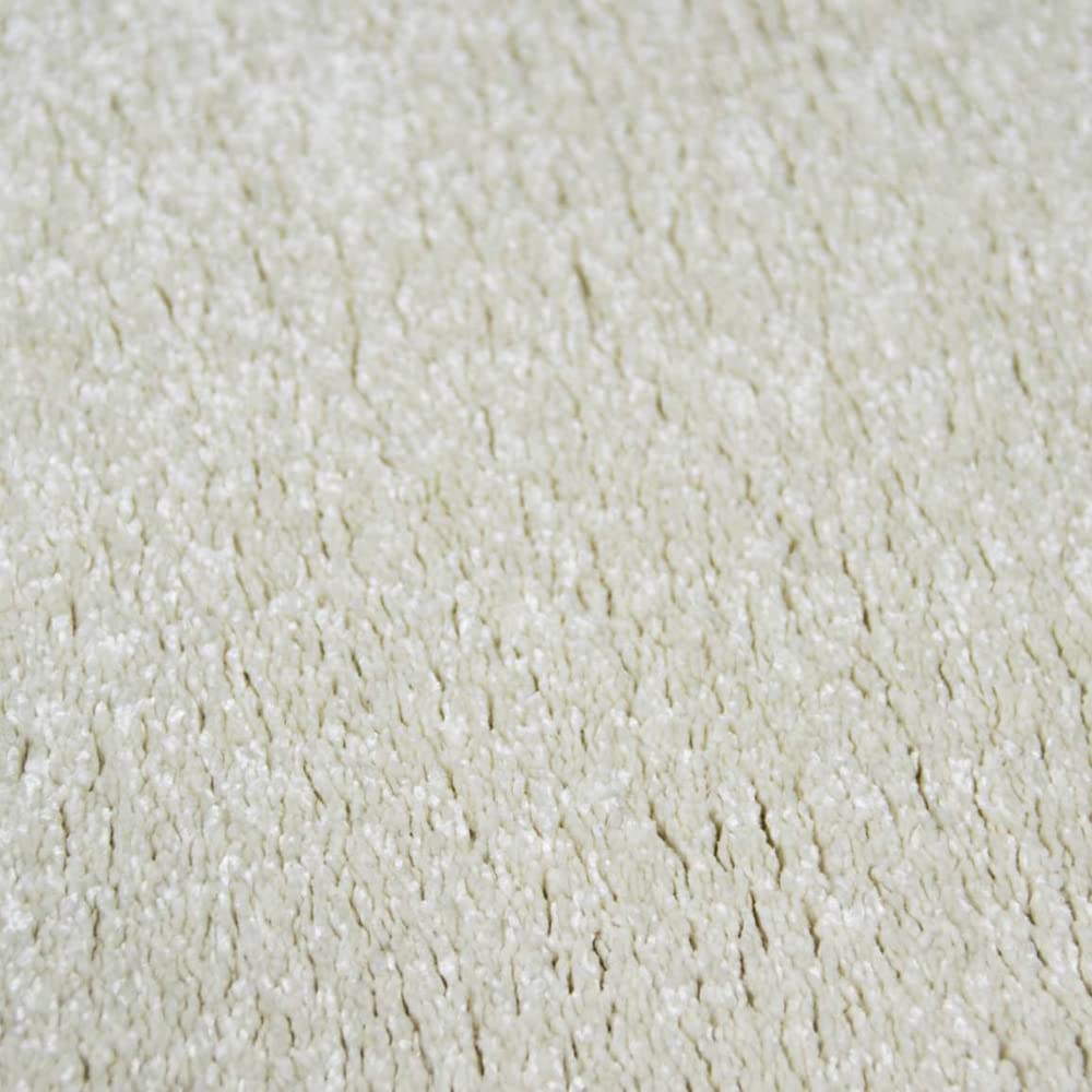 Nowoczesny designerski dywan do salonu w jednolitym wzornictwie w kolorze kremowym 160 x 230 cm