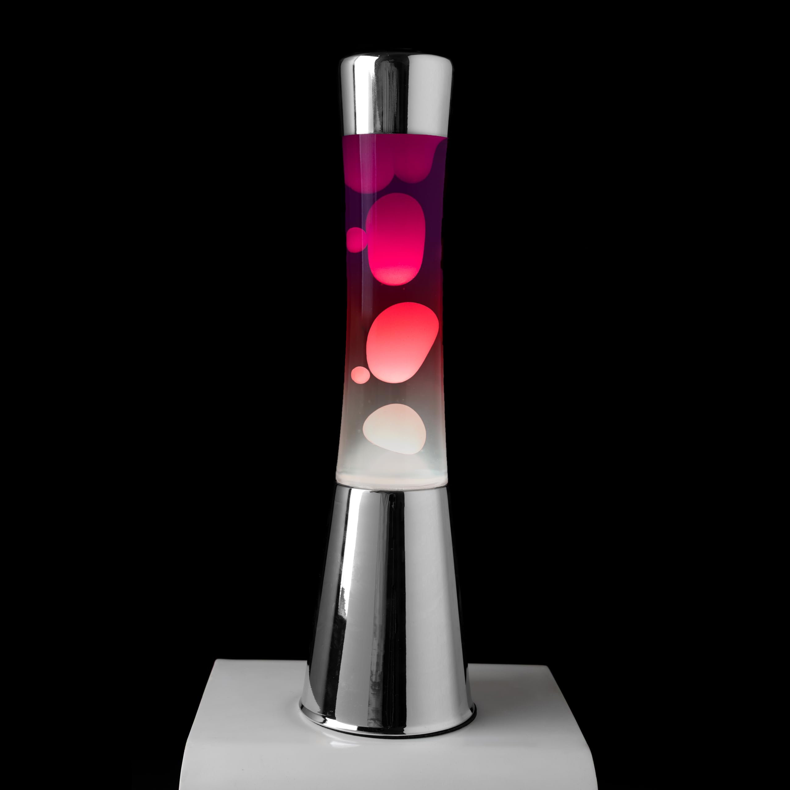 Fisura – Lampa z lawą „gradient czerwony”. Podstawa chromowana, butelka z efektem przejścia od fioletowego do białego. Lampa relaksacyjna z zapasową żarówką. 11 cm x 11 cm x 39,5 cm.
