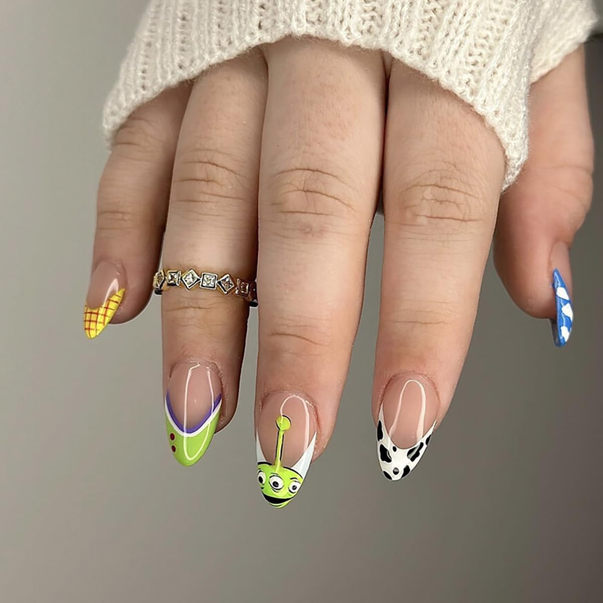 Photo 1 of 24Pcs Halloween Press on Nails Medium Almond Fake Nails with Cute Cartoon Pattern Design Reusable False Nails Kit French Tip Nails Press ons Artificial Nail Cute Funny Almond Stick on Nails for Women