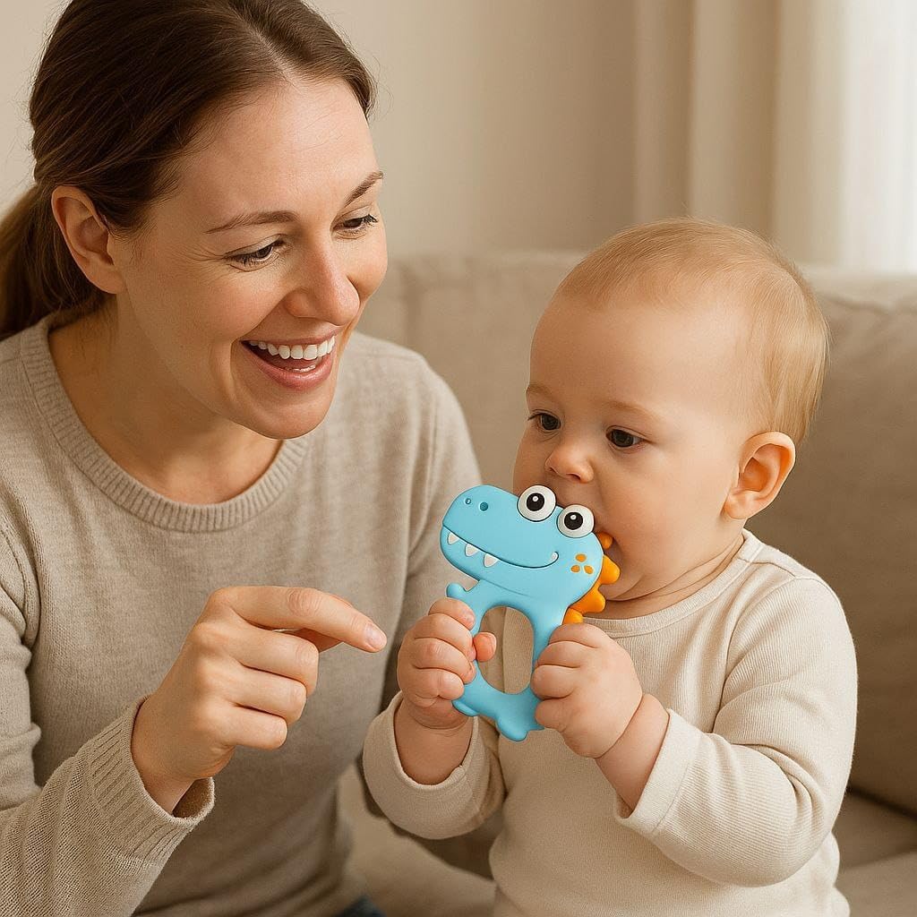 Blushbaby Silicone Baby Teether for Babies 6-12 Months | Teething Gums Manhattan Rattle Toy with Loop Rings | 100% Food-Grade Silicone & BPA-Free | Dinosaur Teether for Infants & Toddlers (Blue) 1