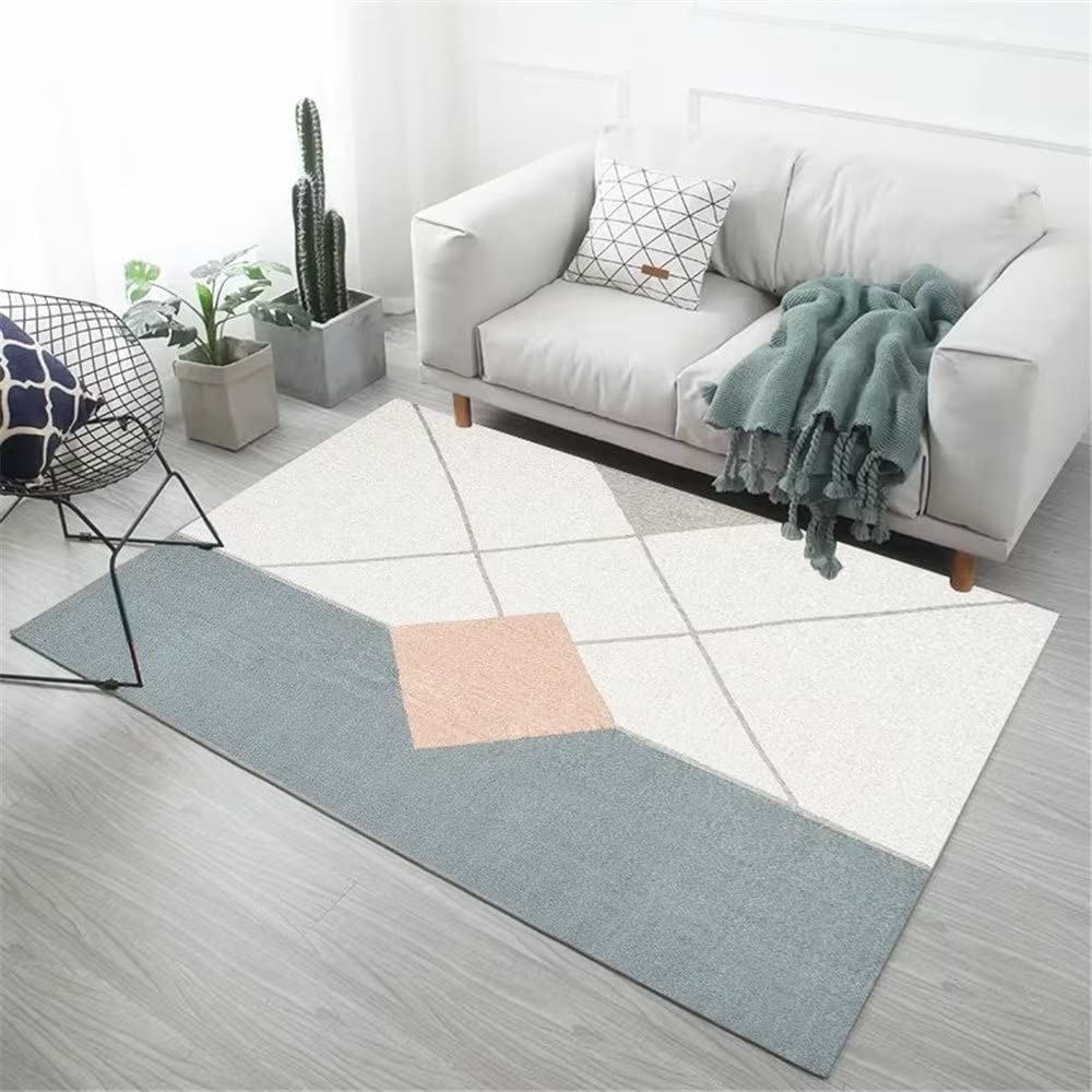 Tapis de salon bleu pour créer un coin lecture moderne et accueillant