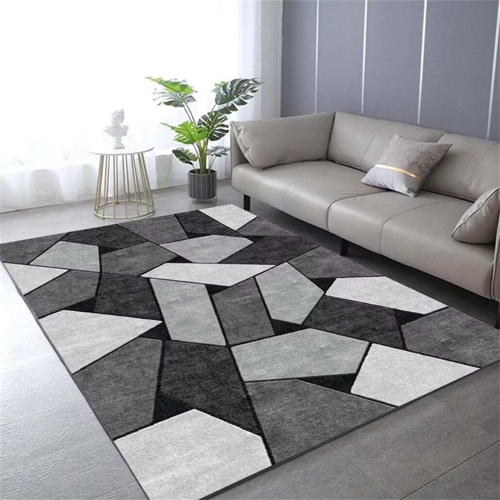 Tapis de salon à poils courts gris pour protéger le sol sous la table