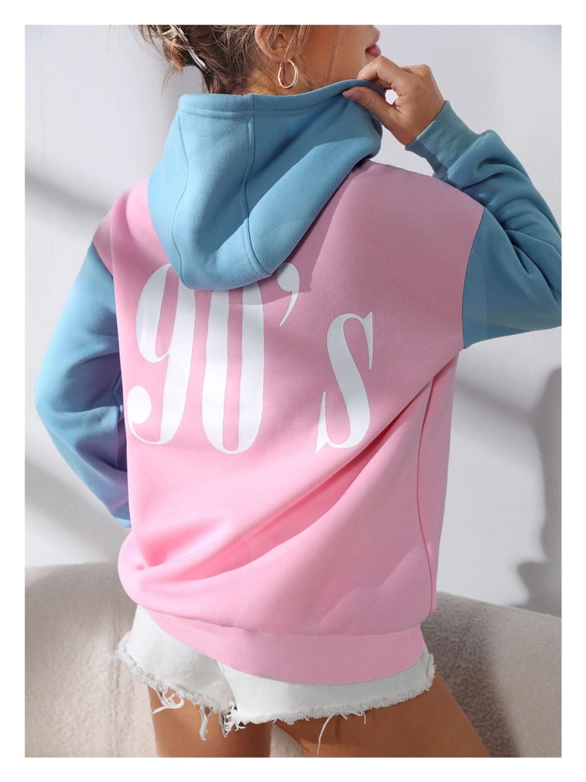 Sweat à capuche femme au design géométrique bicolore et poches taille XS