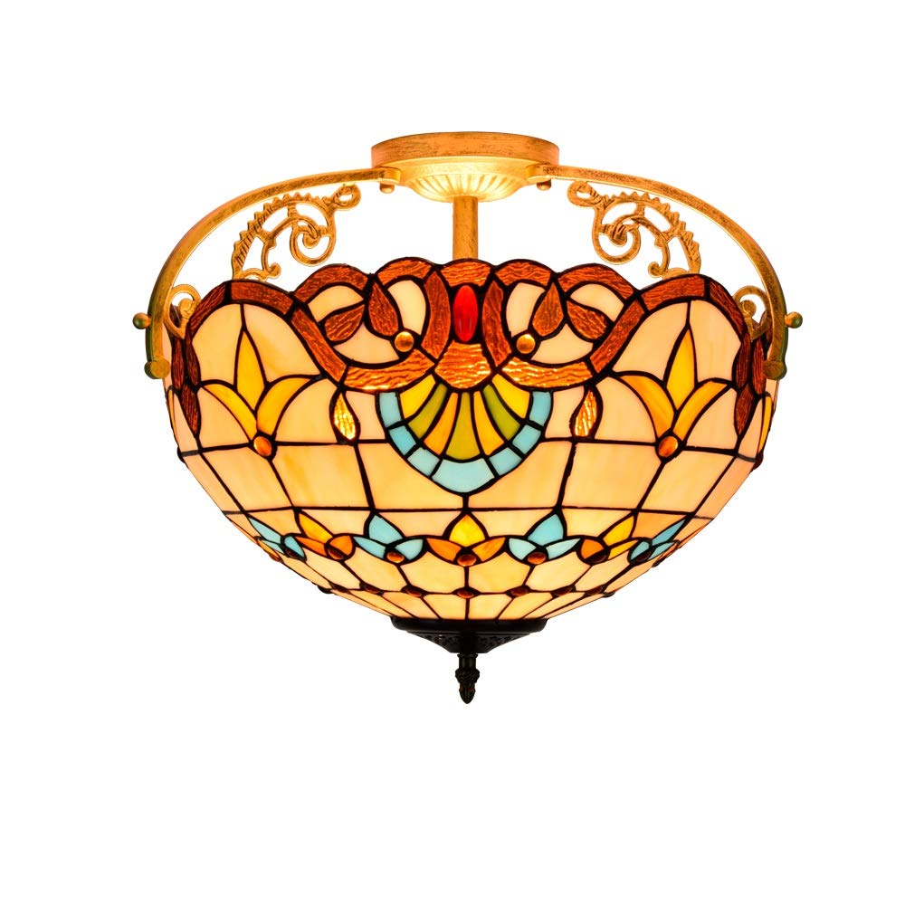 Lampe en verre teinté style Tiffany au motif jaune et baroque