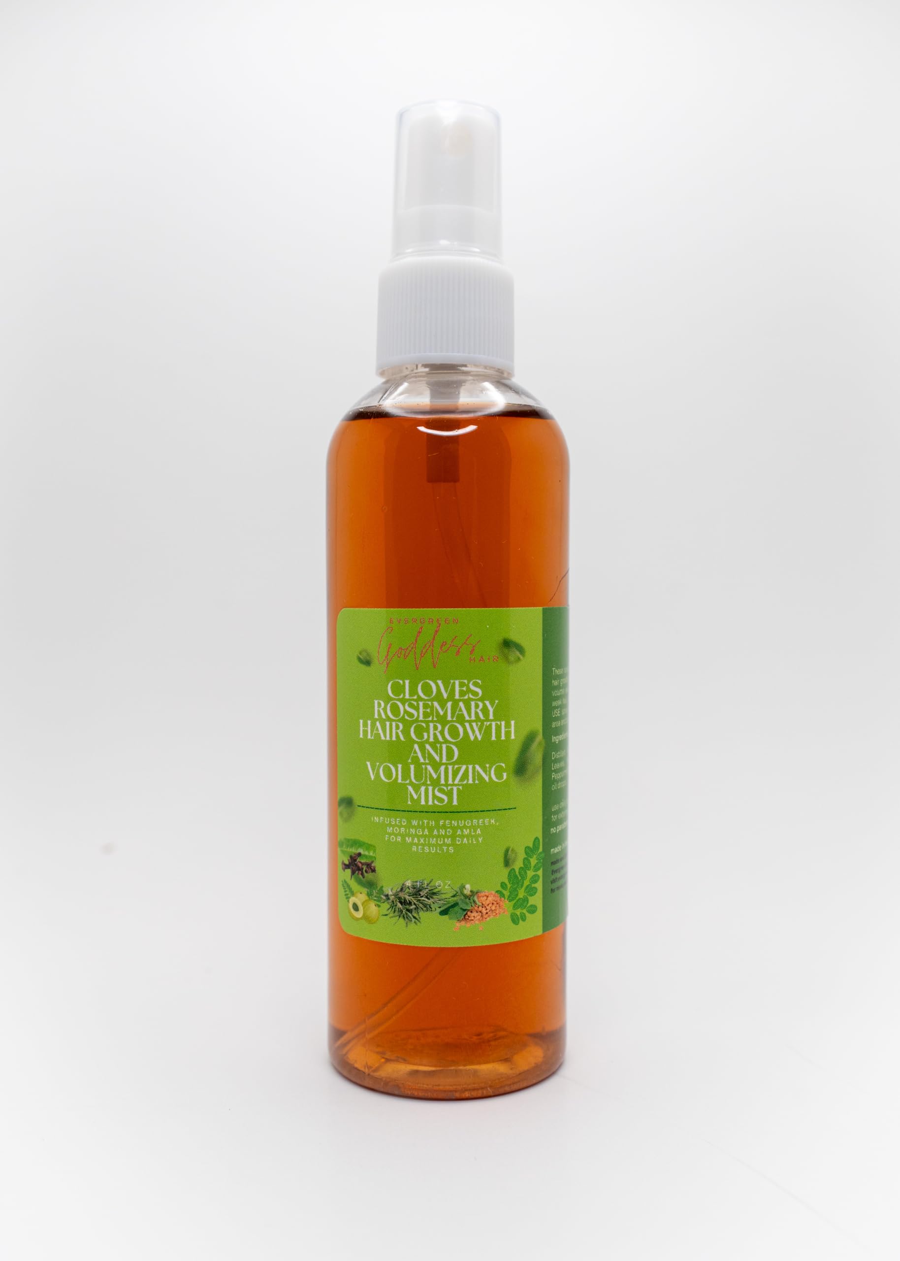 essential oil blend for hair growth: clove rosemary peppermint vitamin E in spray bottle