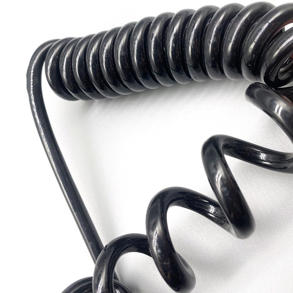 Câble spiralé rétractable pour éviter les nœuds de fils électriques