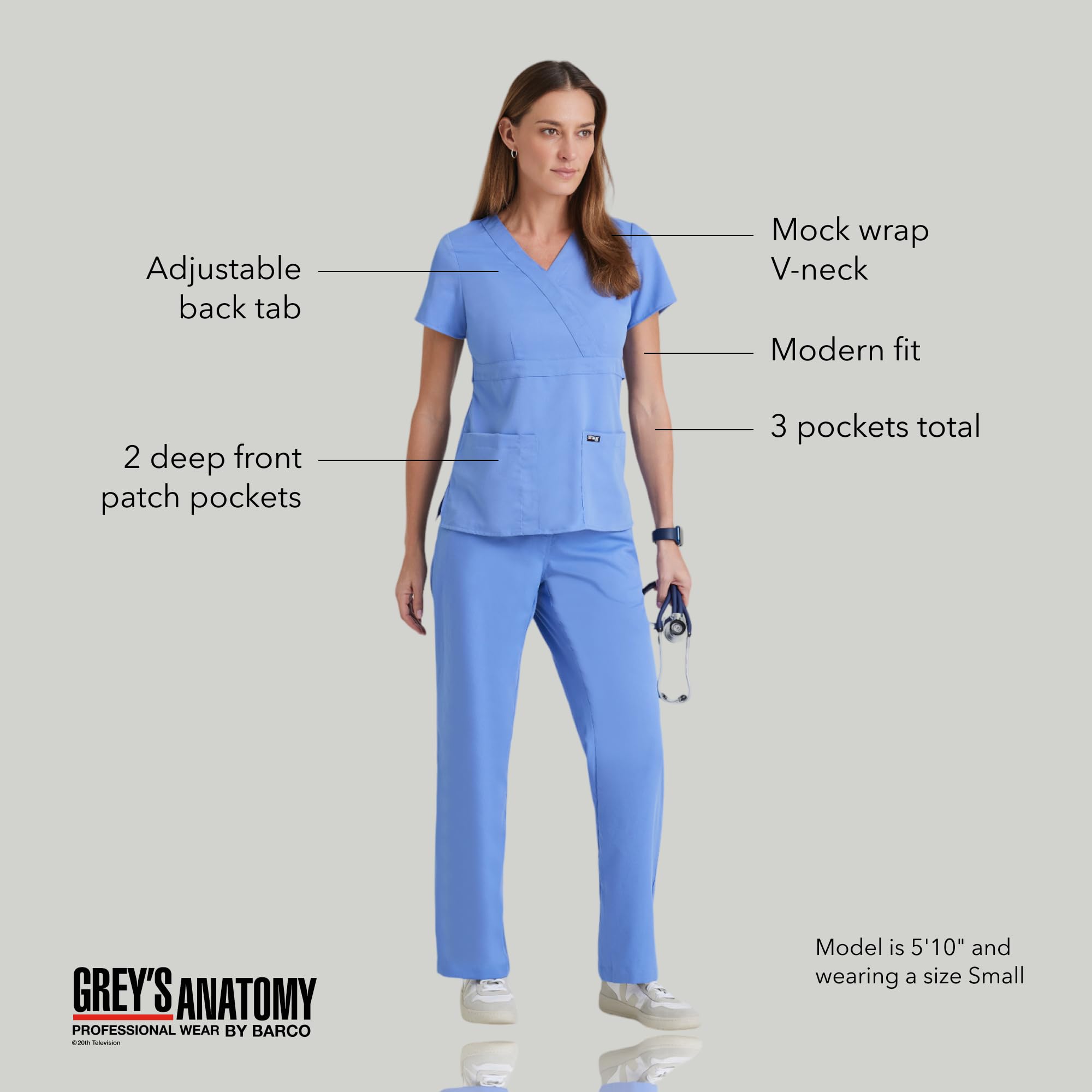 Grey's Anatomy - Chaqueta de uniforme médico para mujer junior con cuello cruzado y tres bolsillos