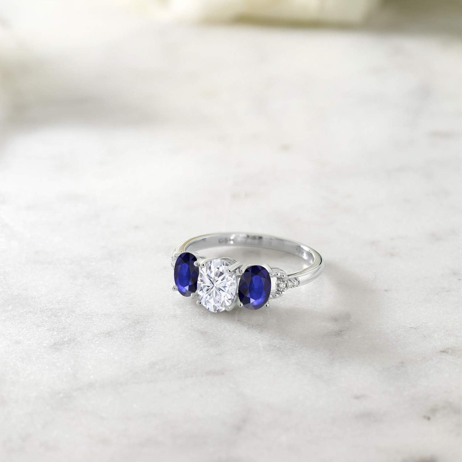 Gem Stone King 10K White Gold Blue Sapphire Moissanite and Diamond Women Engagement Ring (4.56 Cttw)