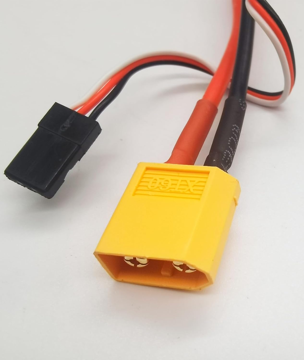 Close-up of XT60 battery connector and servo connector