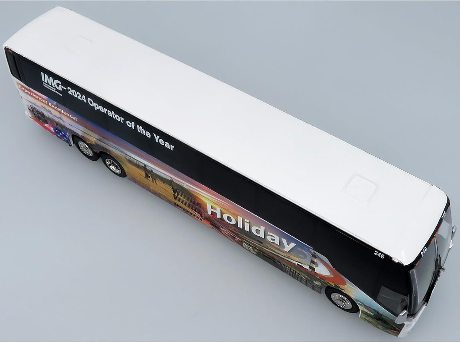 H3-45 Bus Holiday Tours - 2024 IMG Operator of The Year White with Graphics Limited Edition 1/64 Diecast Model 64-0615