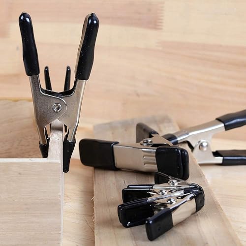 Miniatura 5 de Amazon Basics Juego de 20 abrazaderas de resorte de acero, paquete de 15 unidades de 3/4 pulgadas, 5 paquetes de 1 pulgada, negro/plateado