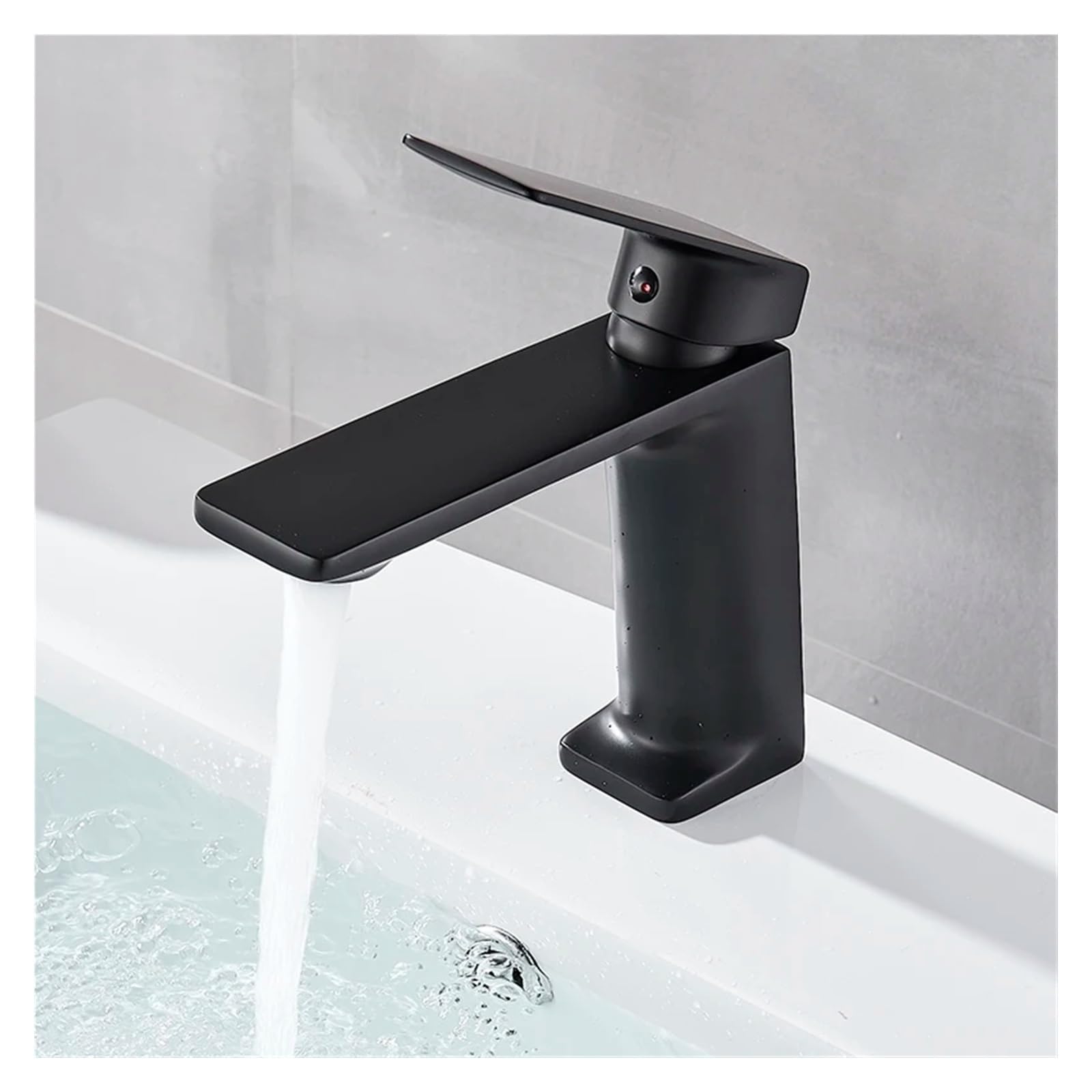 Robinet de lavabo pour une salle de bain moderne avec meuble vasque encastrée