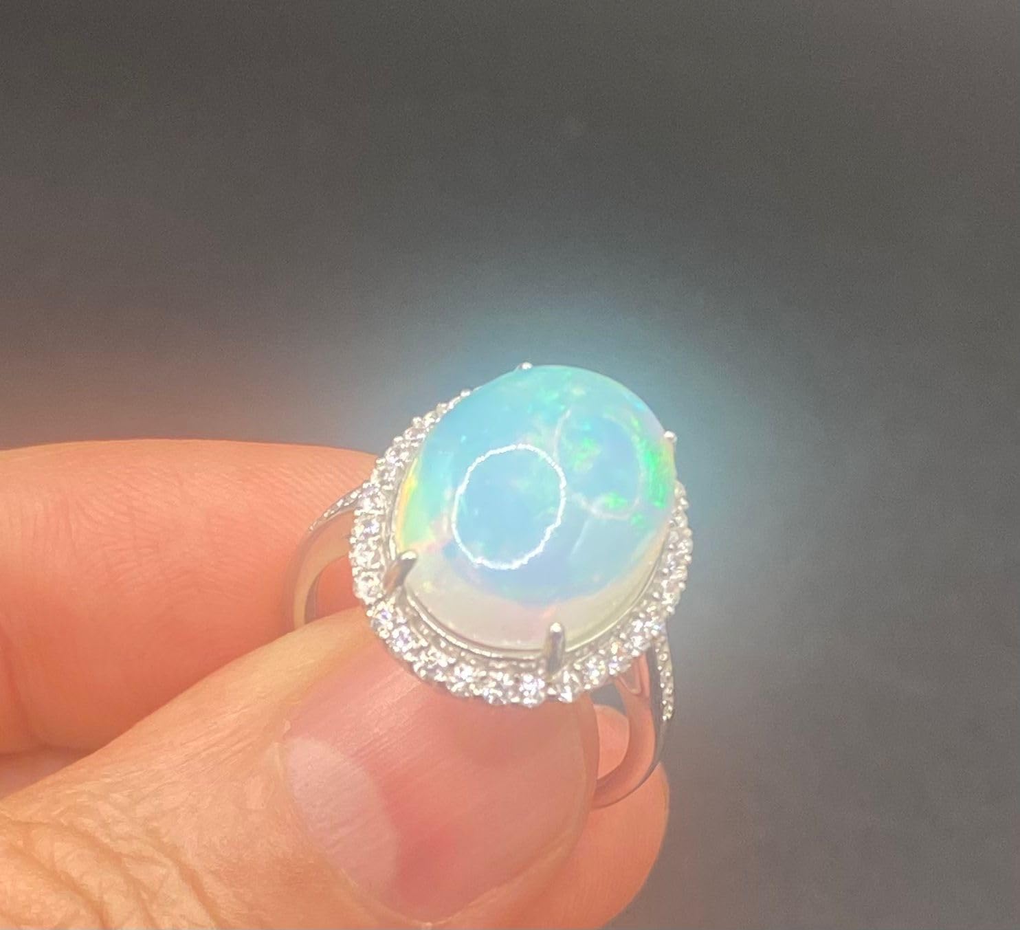 Natural Ethiopian Opal Ring for Women – Large 12×16mm Oval Cabochon with CZ Halo | Pure Silver Adjustable Band | 15×20mm Surface Size | Statement Opal Jewelry (4.10g)