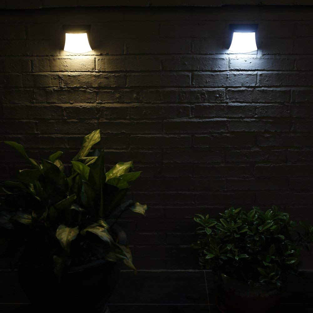 Kinkiety ścienne, 4-pak lamp solarnych z 4 diodami LED, zewnętrzne kinkiety z uśmiechem, bezprzewodowe lampki nocne do schodów bezpieczeństwa
