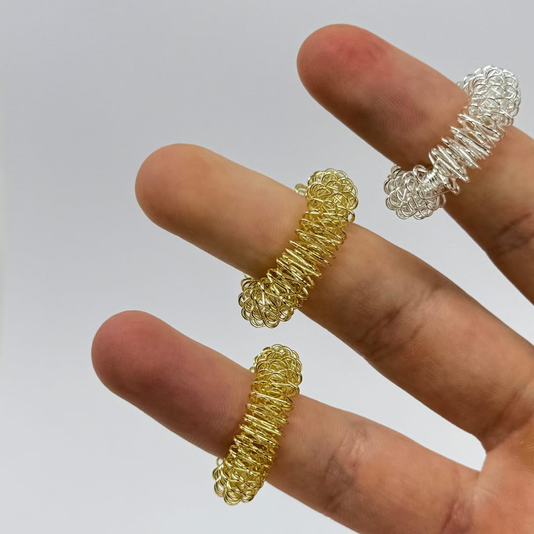 ATC Handels GmbH Anillos de masaje de dedos en oro o plata para los dedos, dedos de los pies, de acero para muelles para momentos individuales de bienestar, relajación (plata y oro, 10 unidades cada