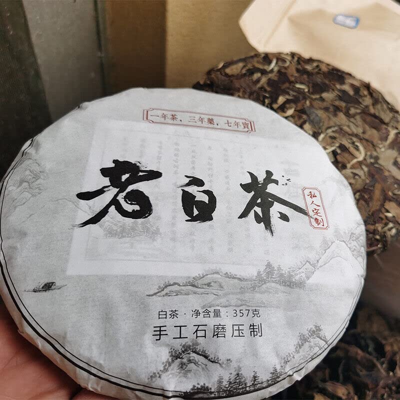 Thé blanc du Yunnan bio pressé main en galette de 357g de prestige