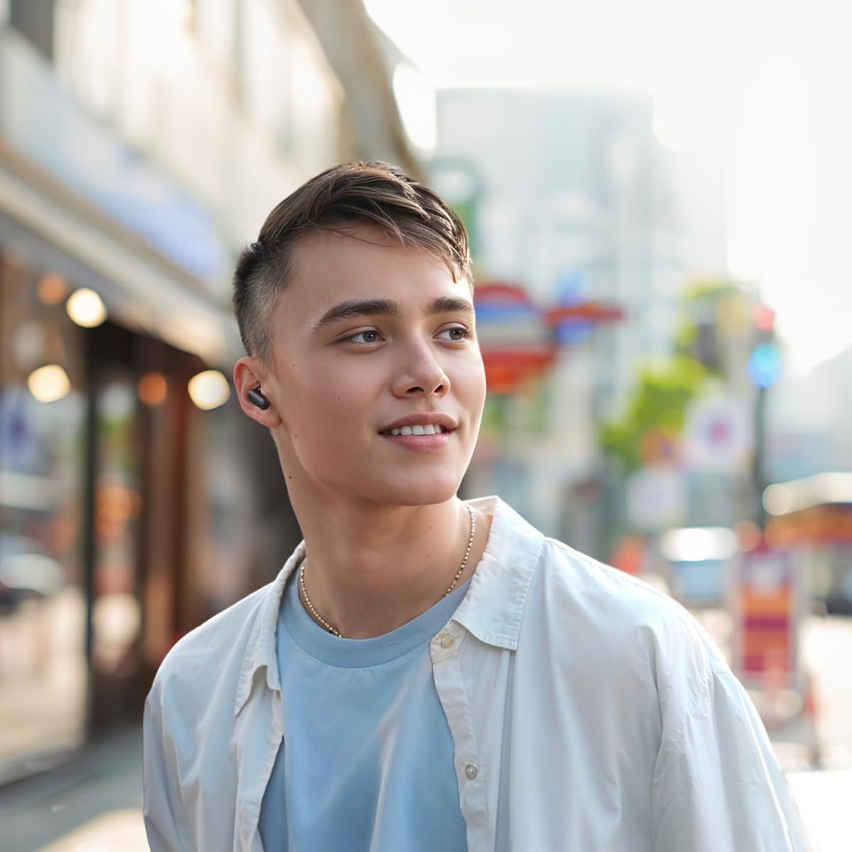 Person wearing Anker Soundcore R50i NC Earbuds