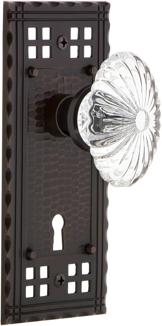 Nostalgic Warehouse Craftsman Plate with Keyhole Passage Oval Fluted Crystal Glass Door Knob in Timeless Bronze