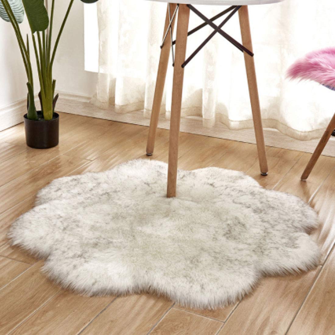 Levoberg - Alfombra de piel de oveja redonda (pelo sintético, 60 cm), color blanco y negro
