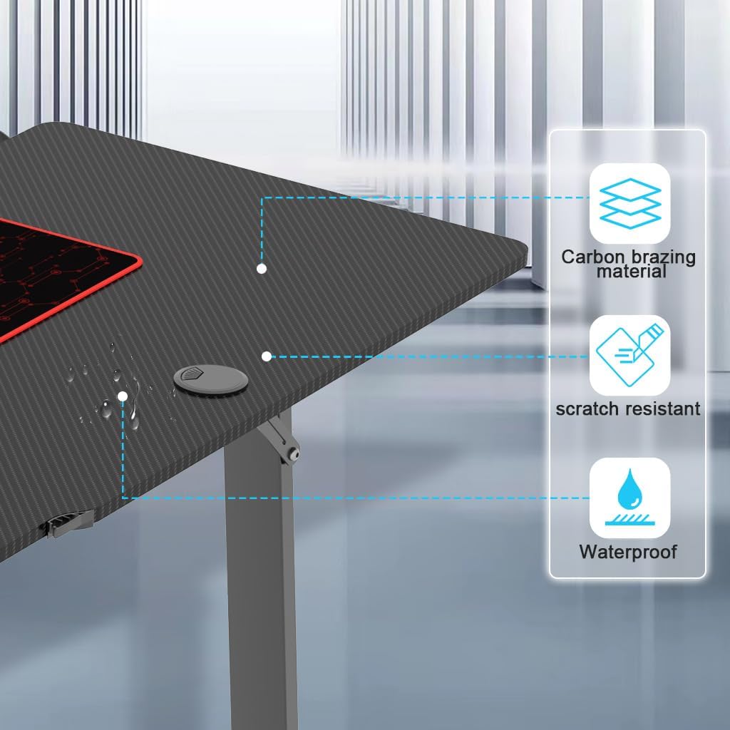 Close-up of desk accessories including cup holder, headphone holder, gamepad holder, cable holes, and cable management