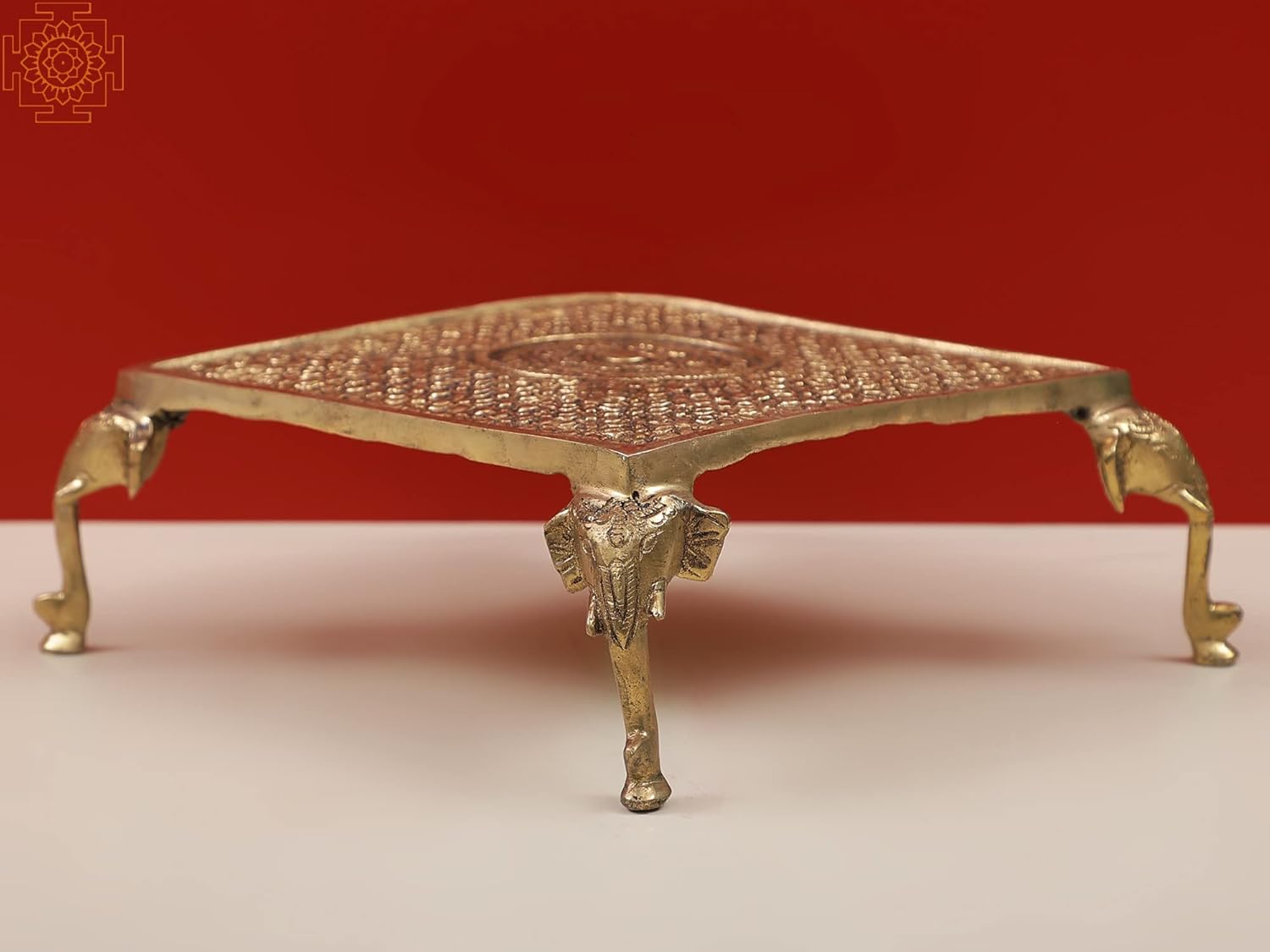 Exotic India 9 Small Elephant Legs Designer Chowki (Pedestal) - Brass - Color Natural Brass
