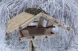 Vogelhaus mit Reetdach von Vogelhäuser-Raschen als Vogelfutterhaus