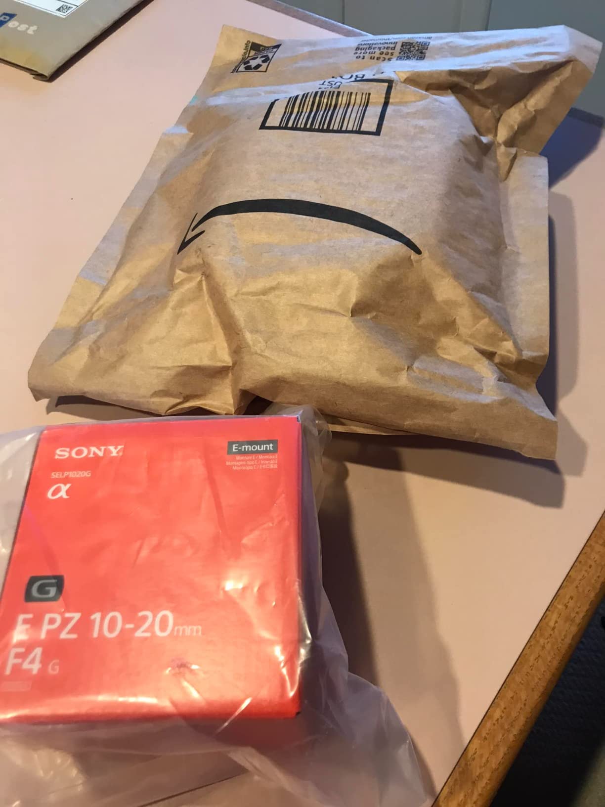 Amazon shipped this fragile lens in a paper bag.