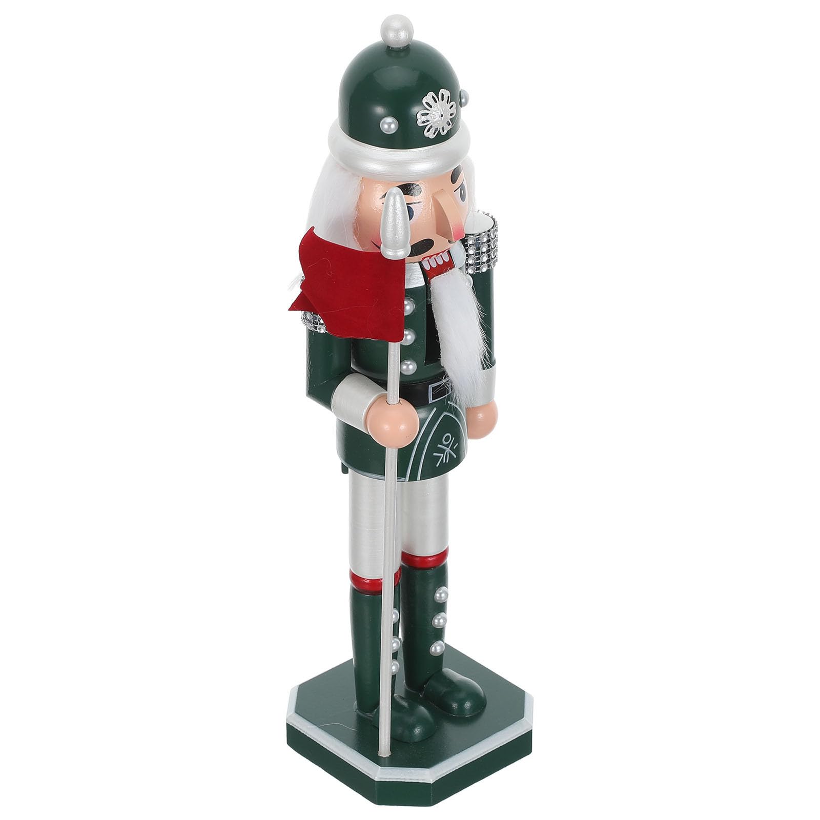 Décoration de Noël avec ce casse-noisette en bois vert perlé pour centre de table