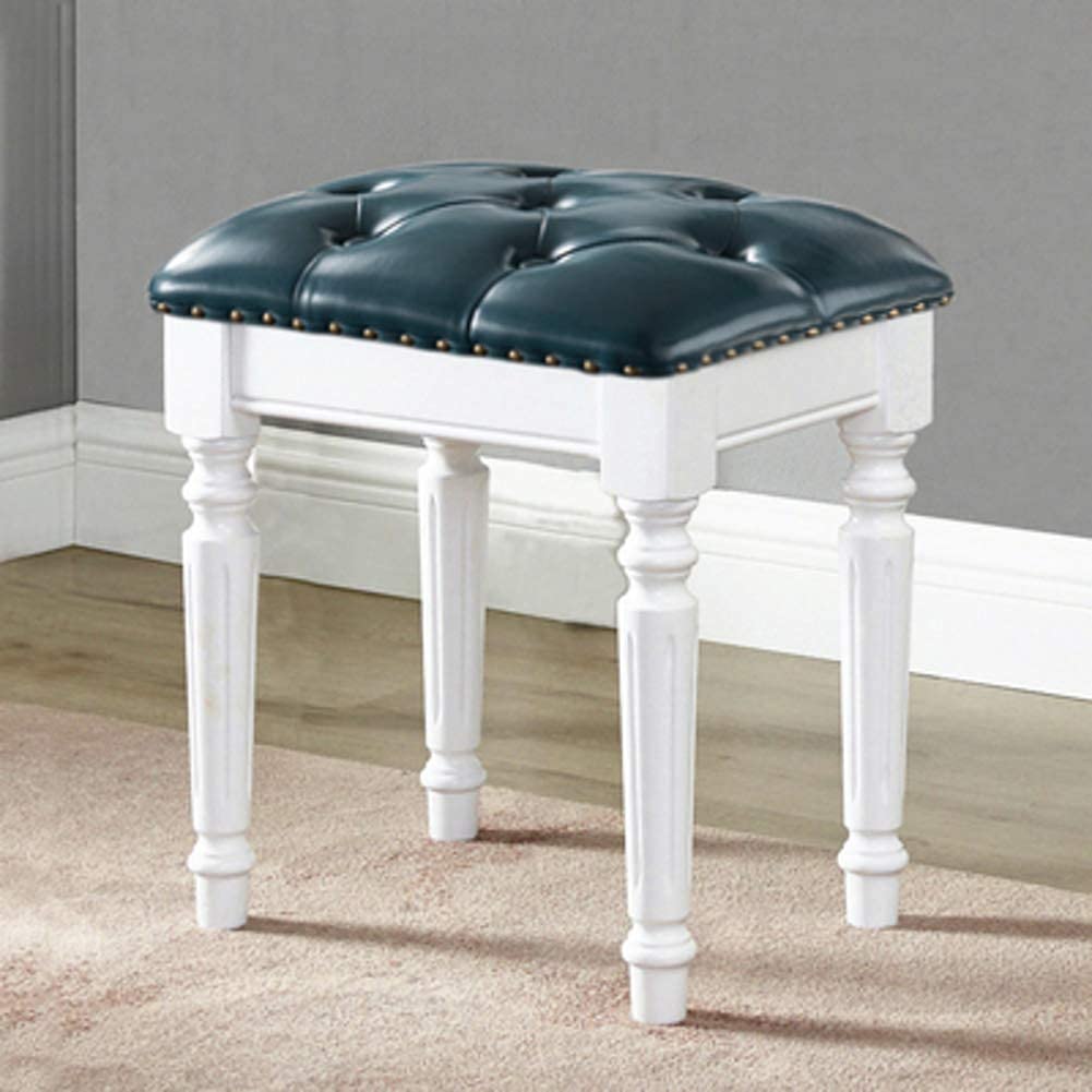 Repose-pieds en cuir bleu pour corriger la posture assise et embellir le séjour