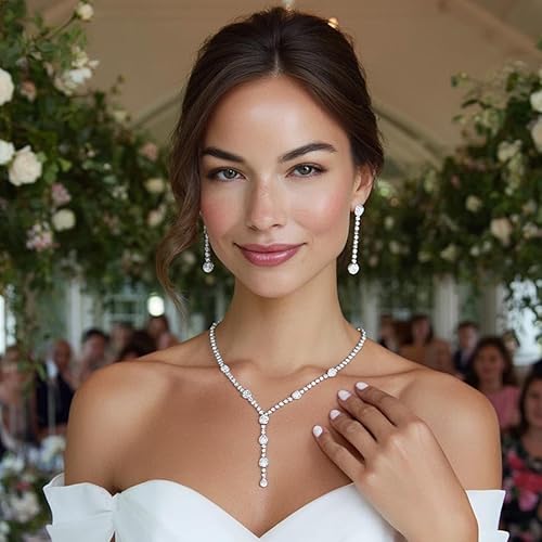 Vista 4 de Unicra Juego de collar y aretes de novia con diamantes de imitación, conjunto de joyas de cristal plateado para novia, juego de joyería de disfraz
